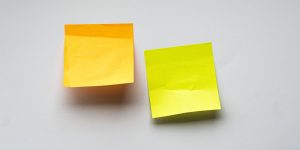 two yellow sticky notes